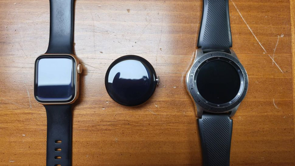 Side-by-side comparison of Apple Watch, Pixel Watch prototype, and Galaxy Watch.